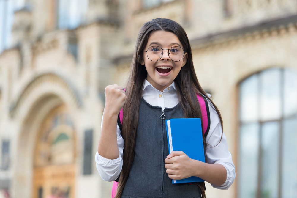 Scholarship,Winner.,Happy,Child,Make,Winning,Gesture,Outdoors.,Scholarship,Student.